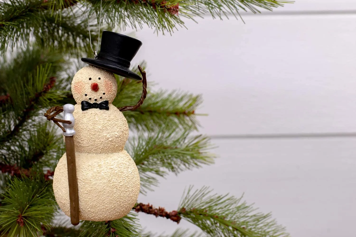 Snowman With Cane Winter White 4 inch Resin Stone Christmas Figurine Ornament